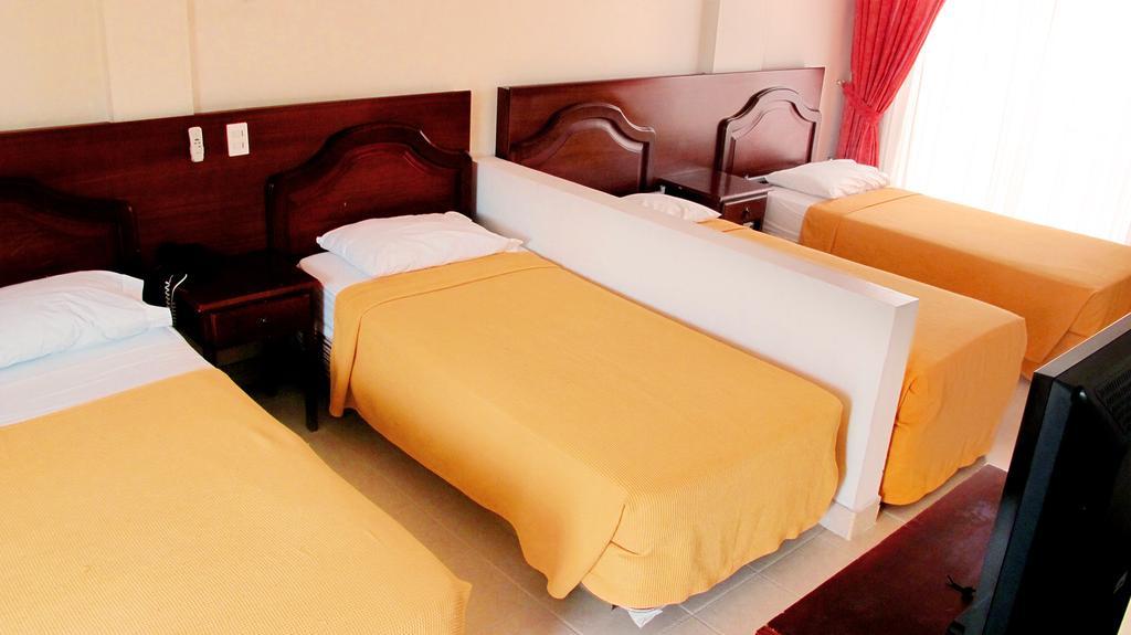 Hotel Palmetto Girardot Quarto foto